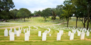 Line of veterans' tombstones at National Cemetery in Marietta, Ga. clipart