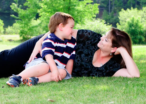 Spring portrait of mother and son on Mother's Day. — Stock Photo, Image
