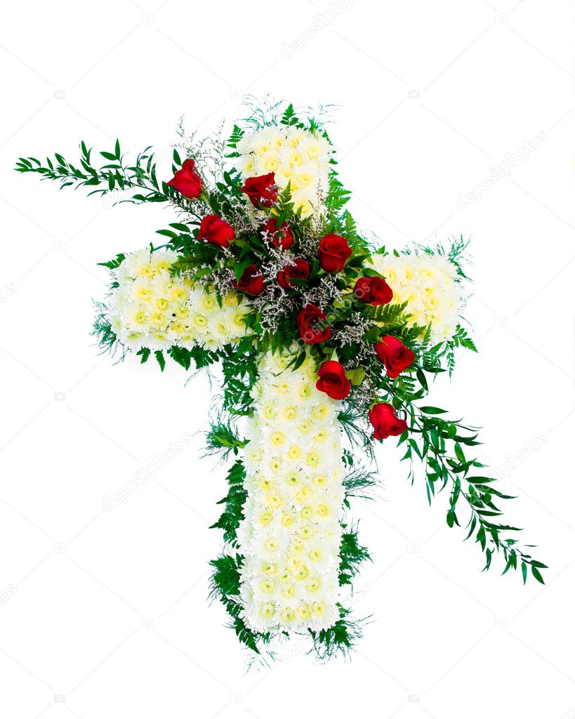 Colorful funeral flower arrangement with Cross design.