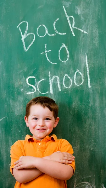 stock image Back to school education concept with child in front of chalkboard