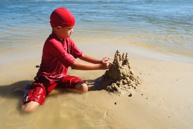 Playing on the beach clipart