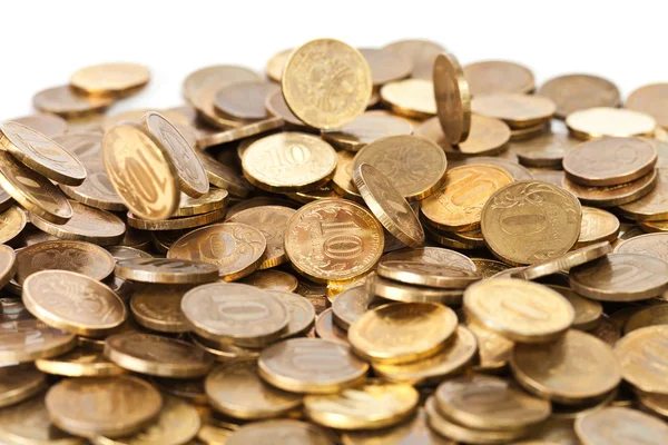 Gouden munten die vallen Stockfoto