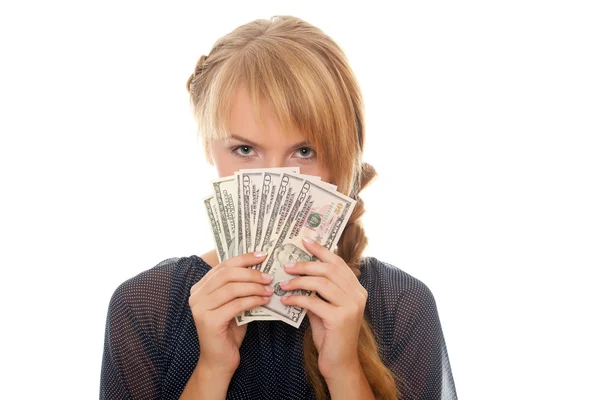 Young woman holding money in the face — Stock Photo, Image