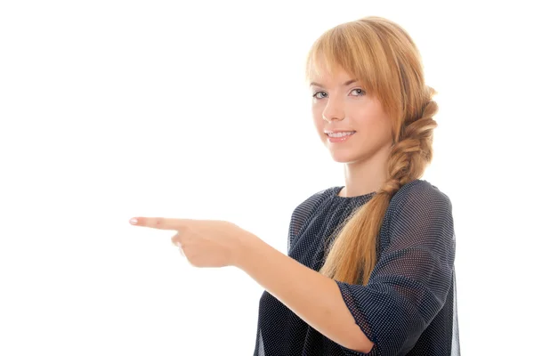 Mujer joven señala el objeto — Foto de Stock