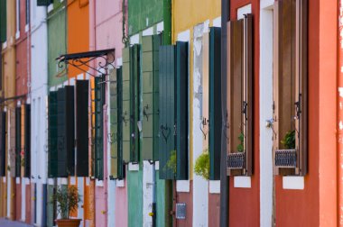 The row of colorful houses in Burano street, Italy clipart