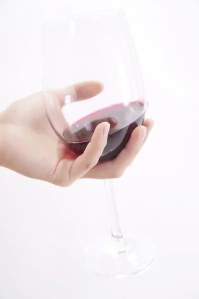 Glass of wine in hand — Stock Photo, Image