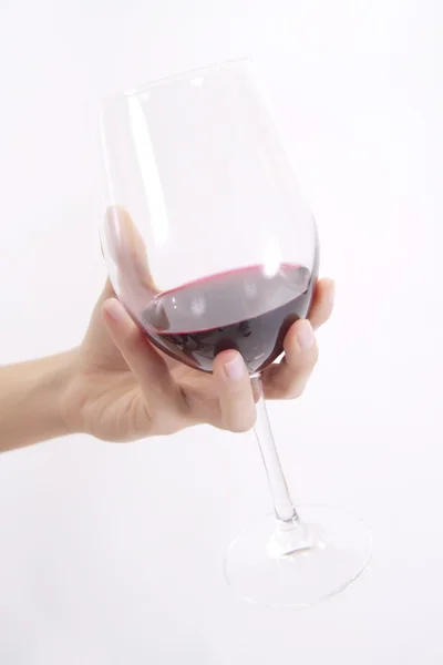 Glas vin i handen — Stockfoto