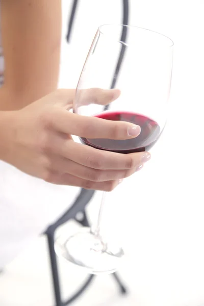 Glass of wine in hand — Stock Photo, Image
