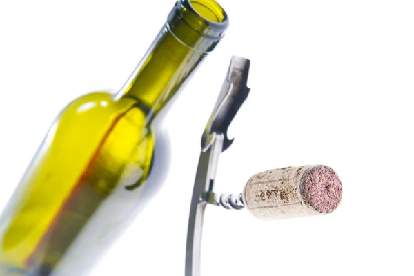 Corkscrew with a bottle of wine — Stock Photo, Image