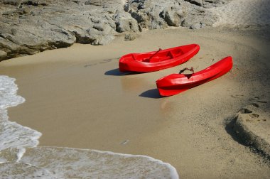 Kayaks on the beach clipart