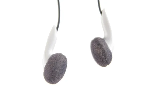 Ακουστικά σε ένα λευκό — Φωτογραφία Αρχείου