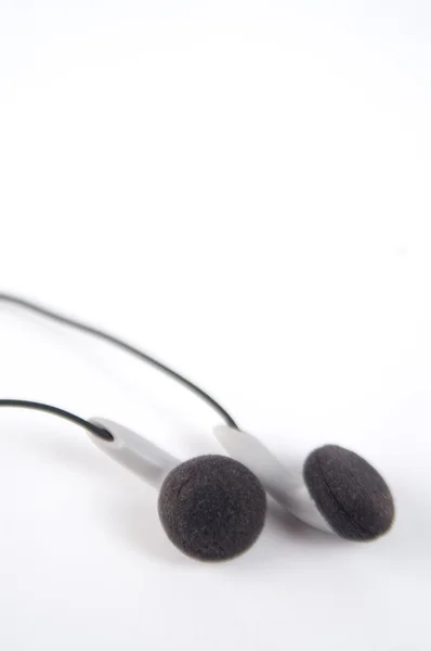 Ακουστικά σε ένα λευκό — Φωτογραφία Αρχείου