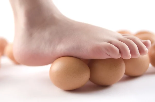 stock image Eggs with children's feet