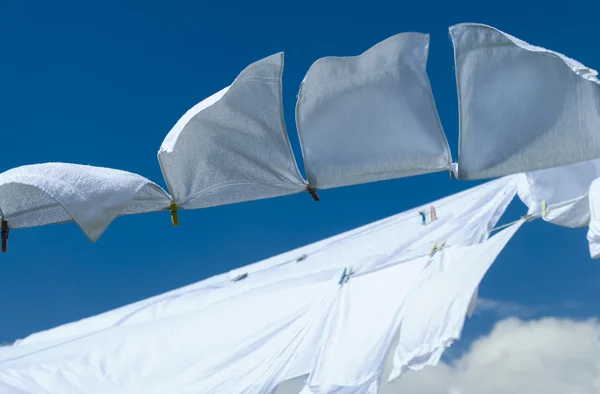 Fresh washed white towels drying on the wind — Stock Photo, Image
