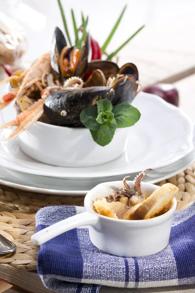 Seafood soup with squid — Stock Photo, Image