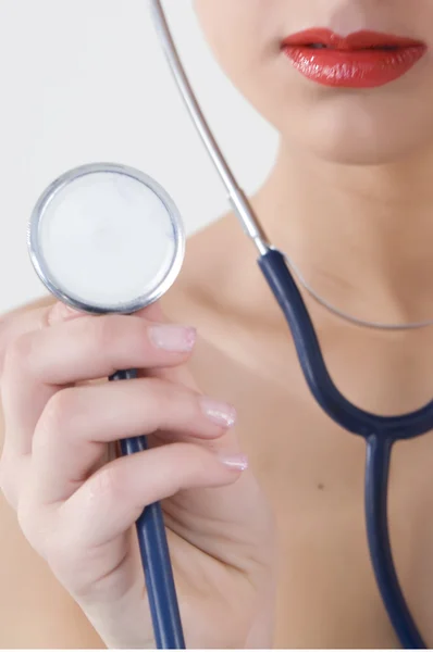 stock image Successful female doctor holding something