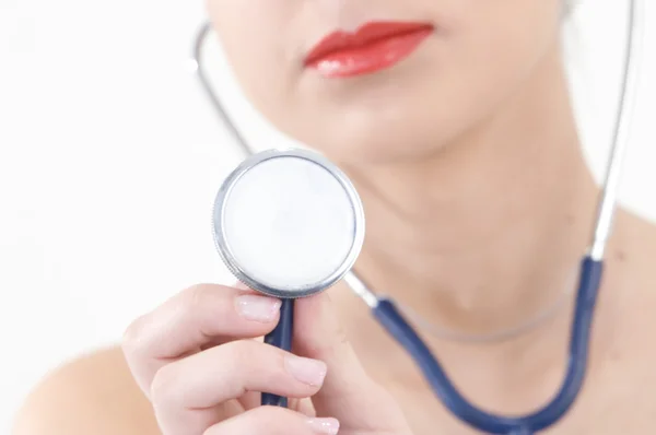 stock image Successful female doctor holding something