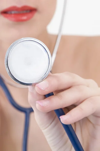 stock image Successful female doctor holding something