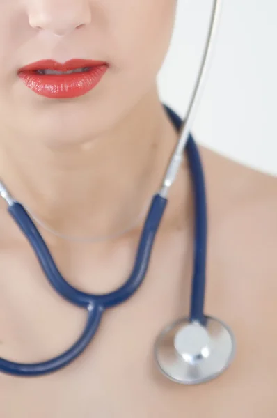 stock image Successful female doctor holding something