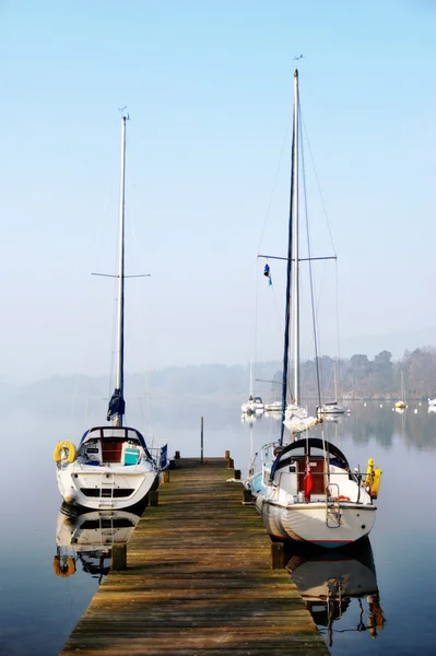 stock image Pleasure yachts moored on rustic jetty