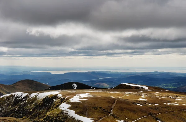 stock image Snow still lines the edges of in the high country