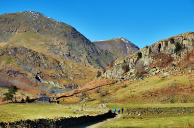 Hikers In Rural Landscape clipart