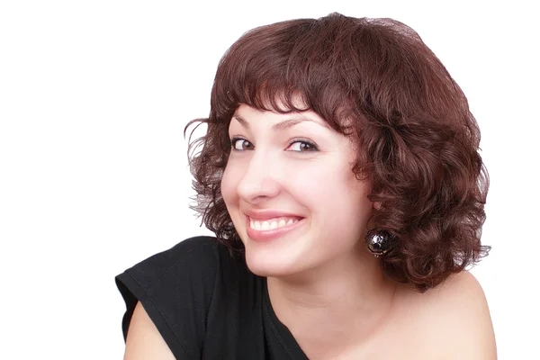 Smilende ung kvinde med krøllede hår - Stock-foto