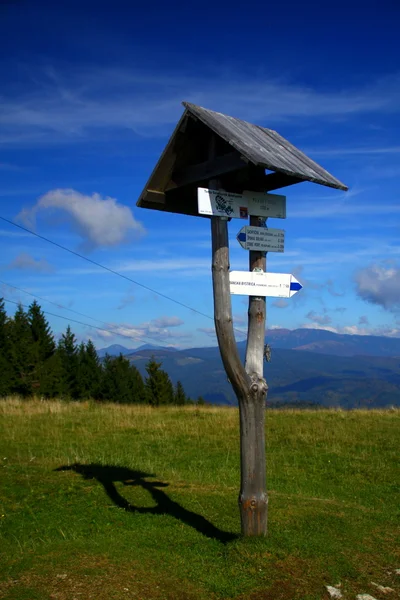 Stock image Turistic sign on the top of the hill