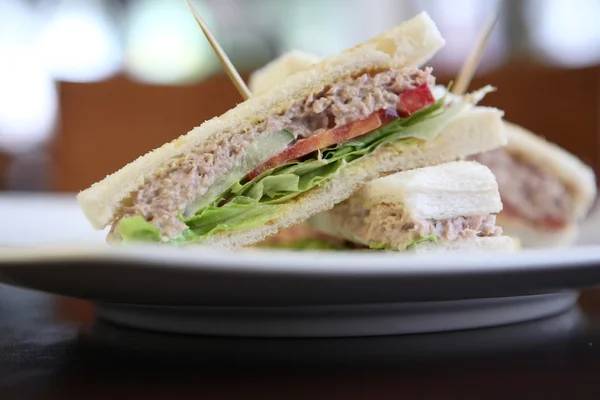 stock image Tuna sandwich on wood background