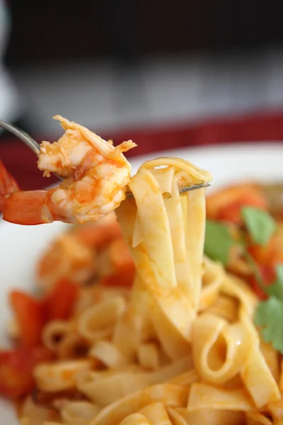 Seafood pasta with tomato sauce — Stock Photo, Image