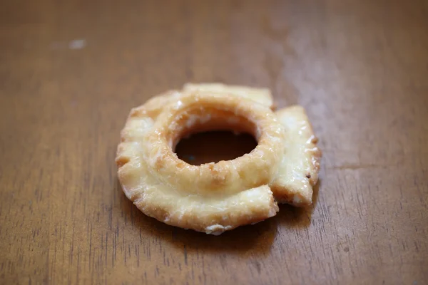 Ντόνατ στο ξύλο παρασκήνιο — Φωτογραφία Αρχείου
