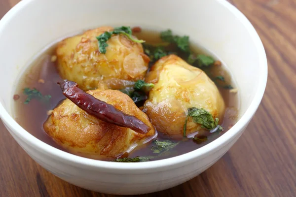 stock image Thai food boiled egg fried with tamarind sauce in wood backgroun