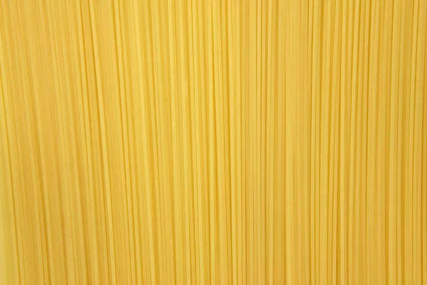Сырой спагетти фон — стоковое фото