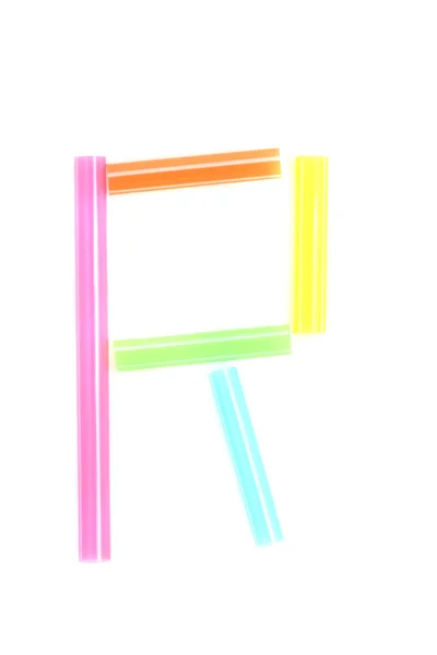 Алфавит R, разноцветная солома — стоковое фото