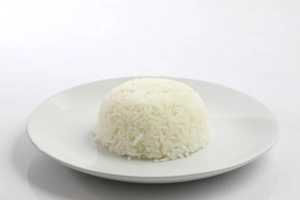 Skål ris på vit bakgrund — Stockfoto