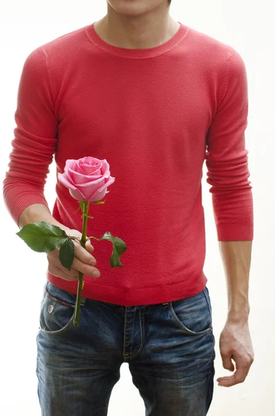 stock image A man holding flower