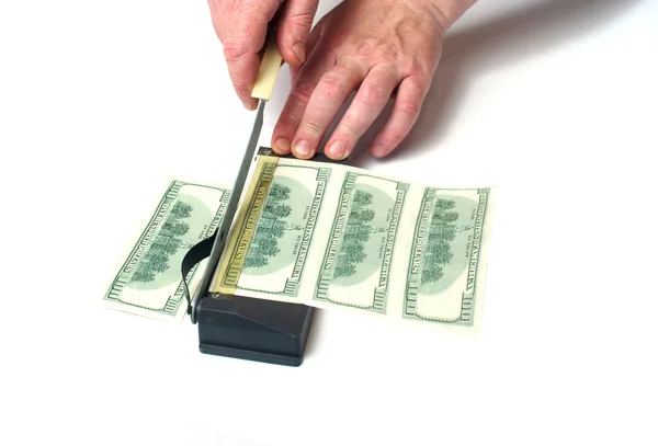 Cutting of the counterfeit money — Stock Photo, Image