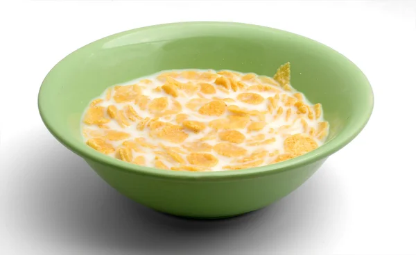 stock image Cornflakes and milk in green plate