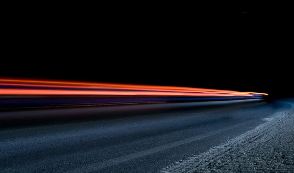 Trilhas de luz do carro no túnel — Fotografia de Stock