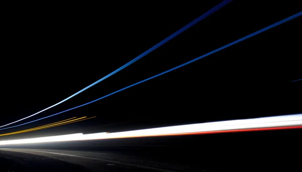 Trilhas de luz do carro no túnel — Fotografia de Stock