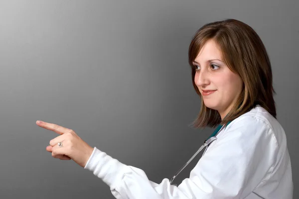 Doctor Pointing Left — Stock Photo, Image