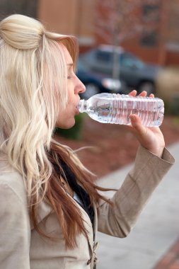 Woman Drinking Water clipart