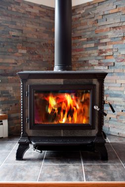 Burning Cast Iron Wood Stove Heating clipart