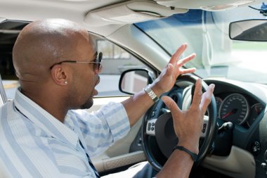 Angry Man Experiencing Road Rage clipart