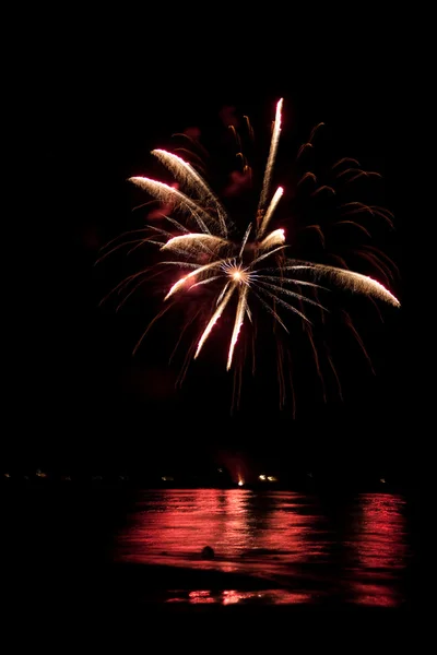 Fireworks Over Water with Reflections — Stock Photo, Image