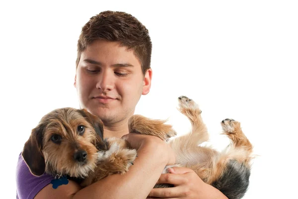 Homem segurando seu cão — Fotografia de Stock