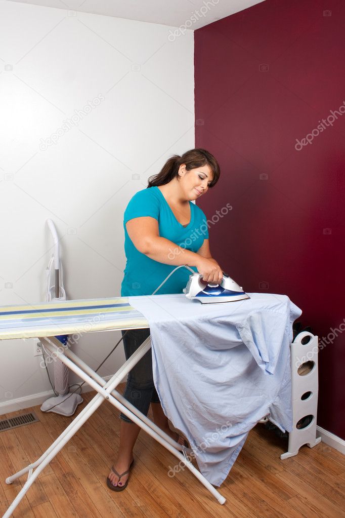 Woman Ironing Clothes