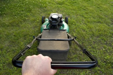 Pushing the Lawn Mower clipart