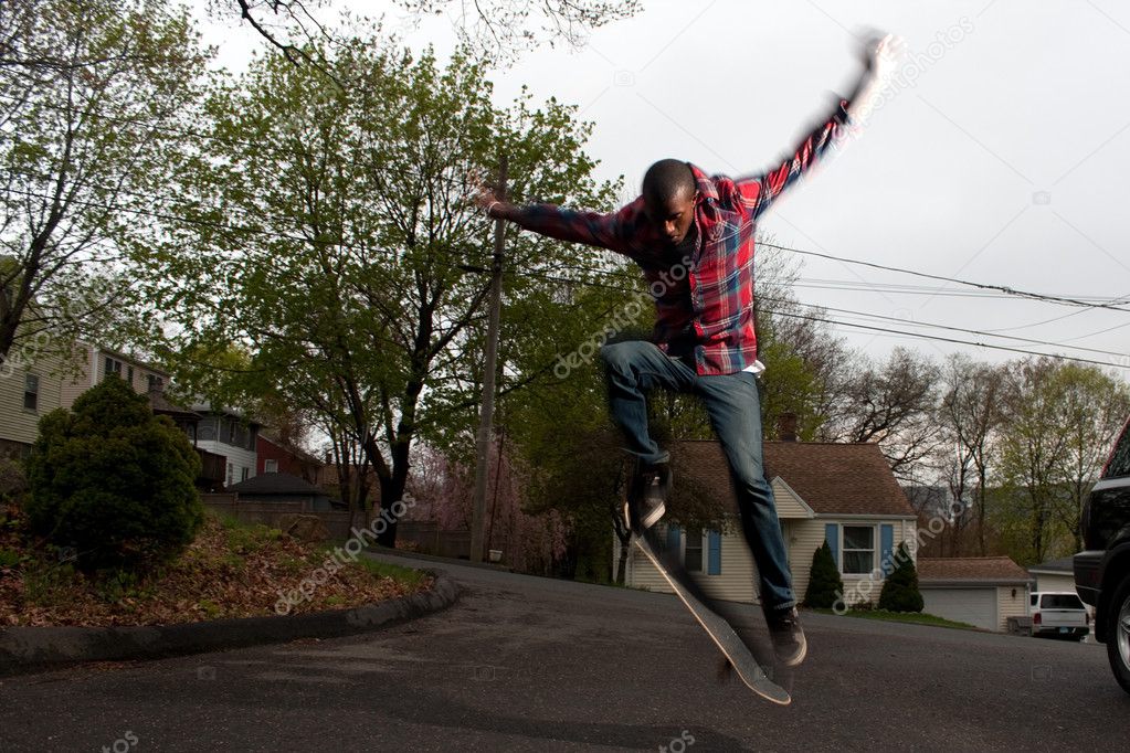 Skateboarder Man Doing an Ollie Jump
