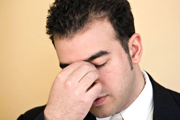Muž s bolestí hlavy — Stock fotografie